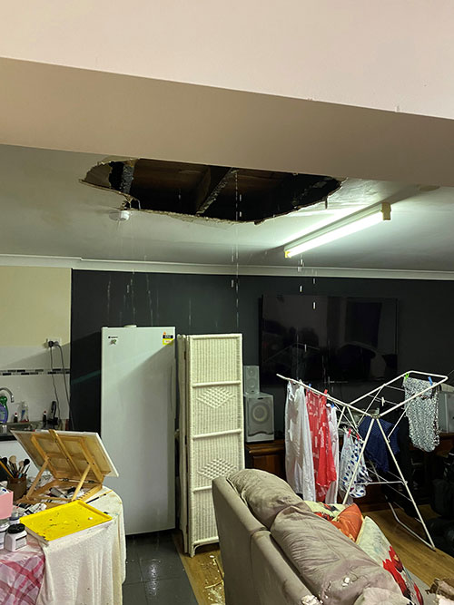 Flooded room. Water dripping from ceiling.